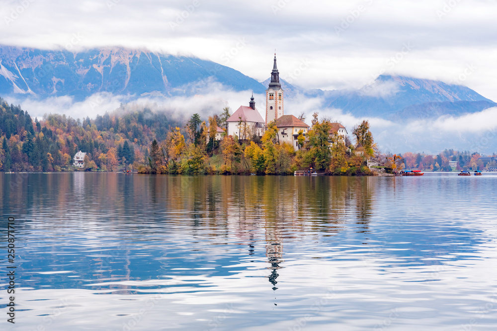 Beautiful autumn landscape around Lake Bled with Pilgrimage Church of the Assumption of Maria