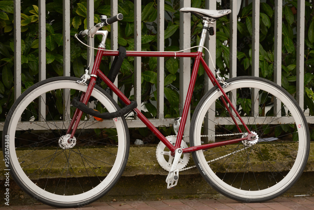 Obraz premium Bicycles parked and locked in different places in the center of the city of Vitoria-Gasteiz (Alava) Basque Country, Spain.
