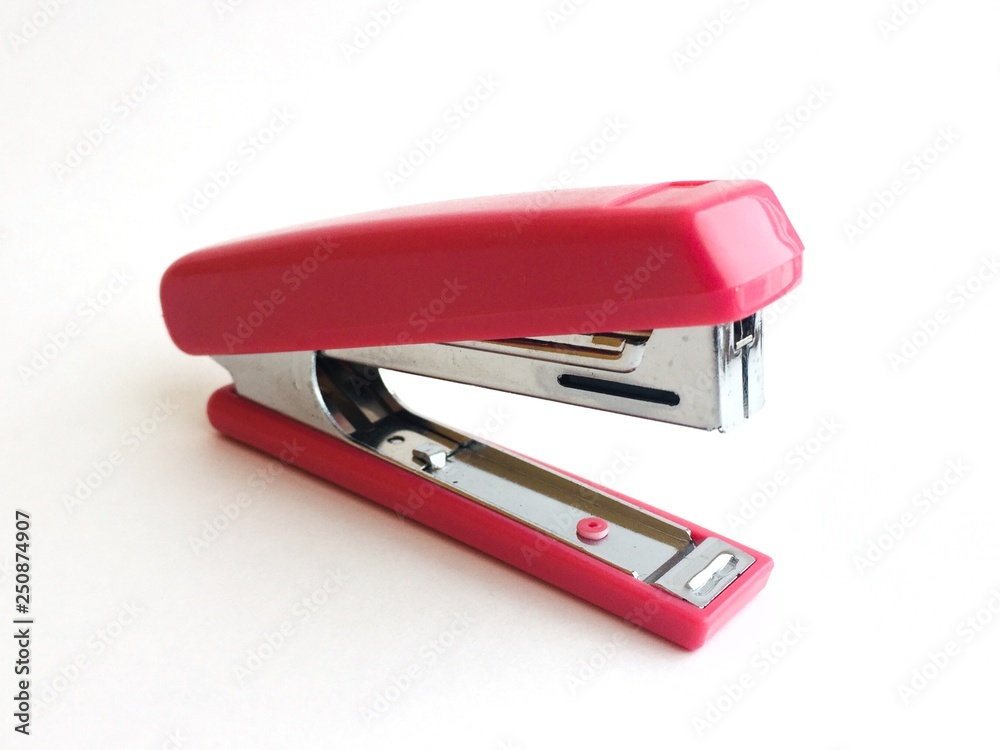 Red stapler, or stapler on a white background Red stapler, or stapler on a white background
