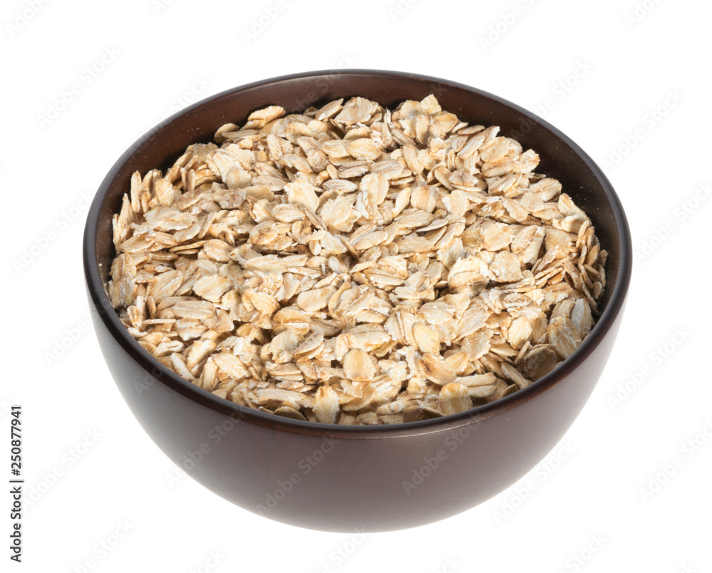Rolled oats, healthy breakfast cereal oat flakes isolated on white Rolled oats, healthy breakfast cereal oat flakes isolated on white