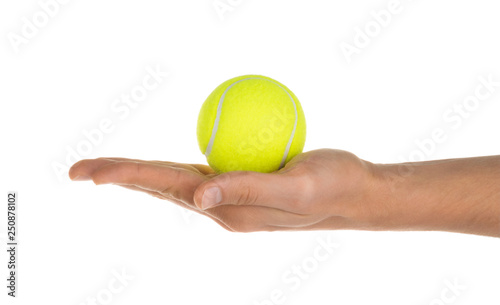 hand holding tennis ball isolated on white clipping path © azure