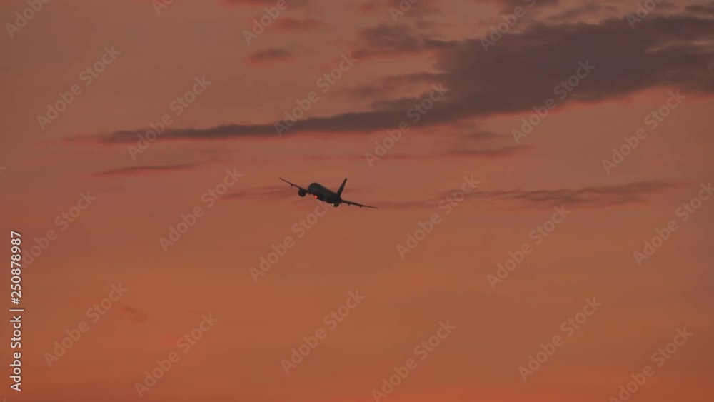 Take-off aircraft against the evening sky after sunset. Take-off aircraft against the evening sky after sunset.