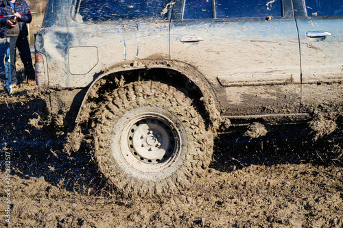 Ukrainian offroad competition in the city of Kamyanets Podilsky. Swamp and mud on cars. Produce large puddles