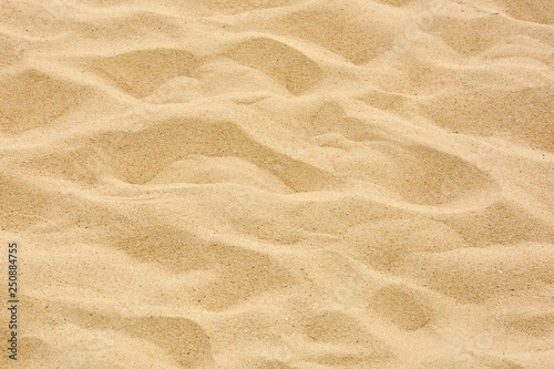 closeup of sand pattern of a beach in the summer