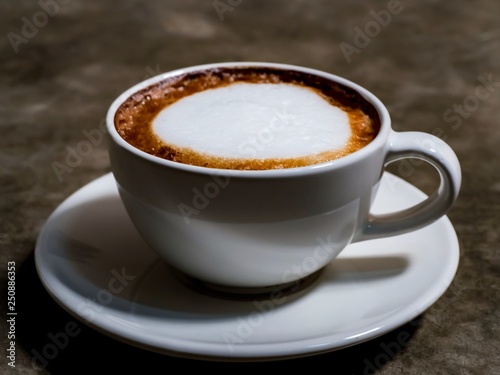 cup of coffee on black background