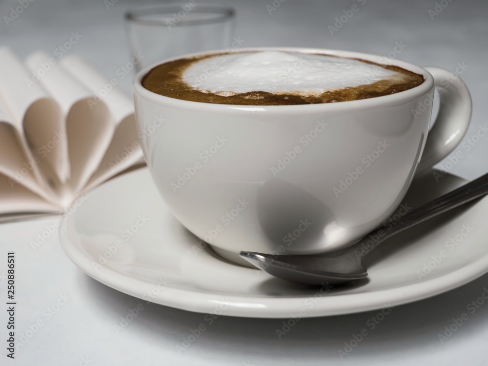 cup of coffee with cream on white background cup of coffee with cream on white background