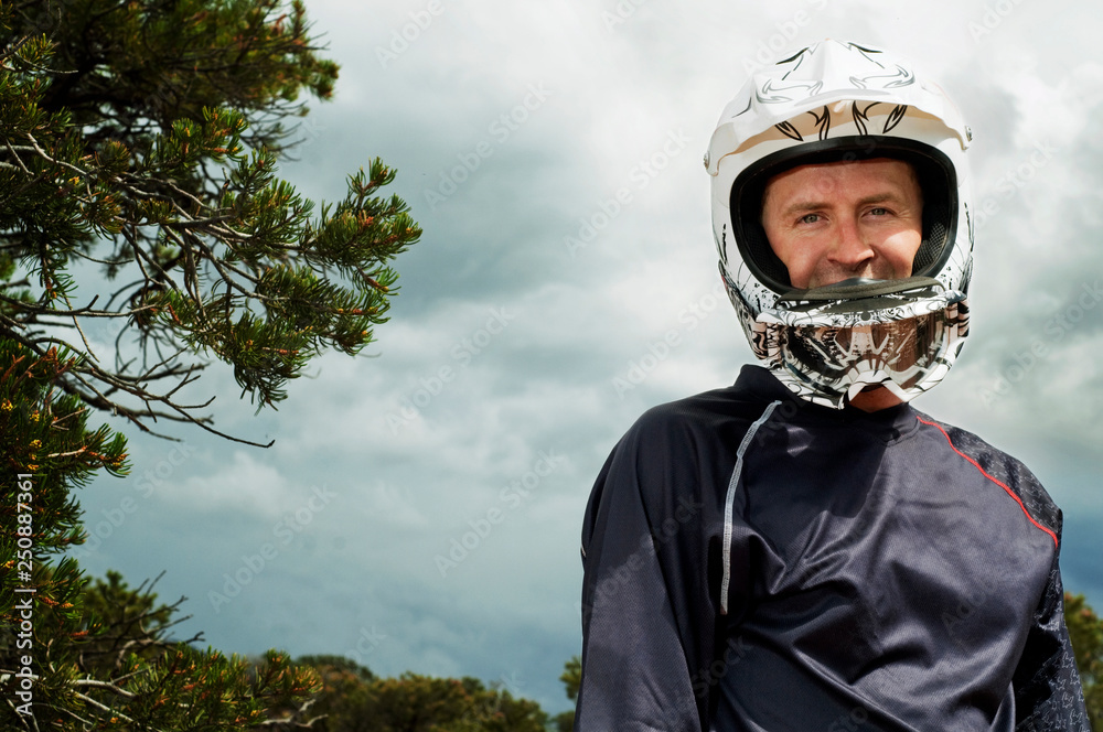 Portrait of downhill mountain biker Portrait of downhill mountain biker