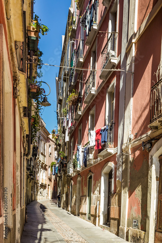 Narrow medieval streets of the old town of Cagliari, capital of Sardinia, Italy © HildaWeges