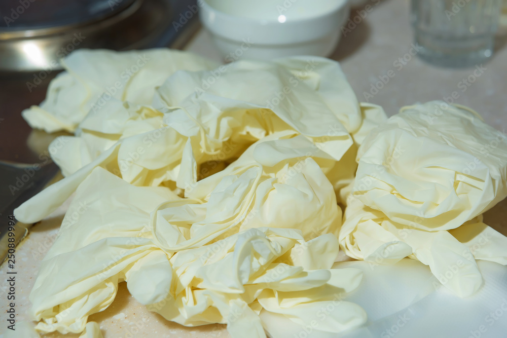 Used white latex gloves. Hygiene in the kitchen. Latex gloves cook