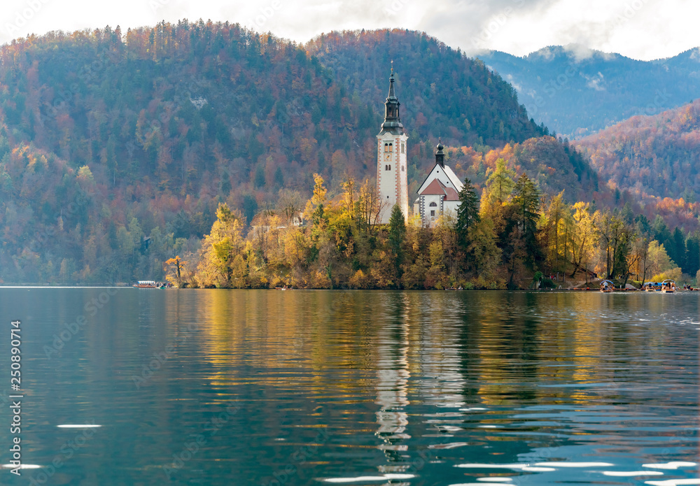 Beautiful autumn landscape around Lake Bled with Pilgrimage Church of the Assumption of Maria