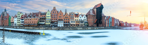 Gdansk winter panorama of the Motlawa embankment with Zuraw Port Crane and other old buildings. photo