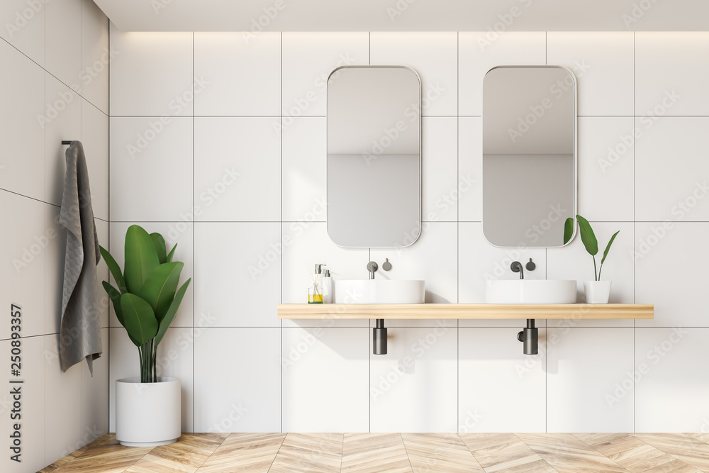 White tile bathroom interior, double sink