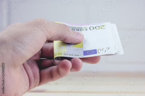  man displaying a spread of cash