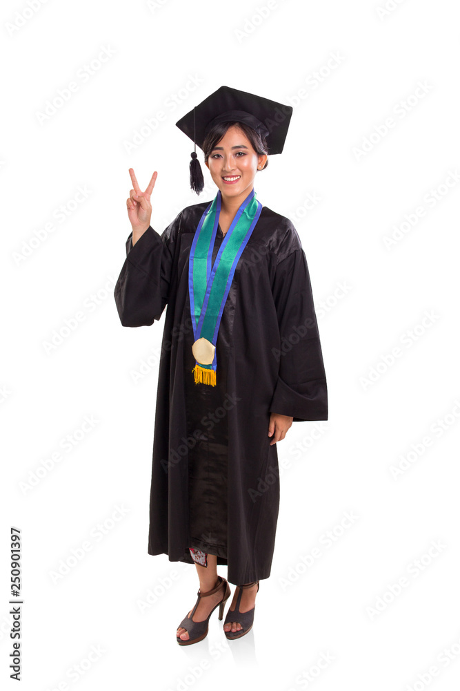 Graduating girl peace sign full body over white background Graduating girl peace sign full body over white background