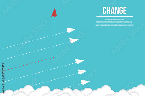 Red airplane changing direction and white ones. New idea, change, trend, courage, creative solution,business, innovation and unique way concept.