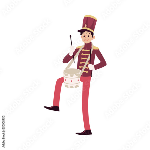 Parade and marching band participant, young drummer playing drum.