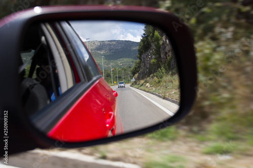 Road in the rear view mirror © KosshkaMebiusa