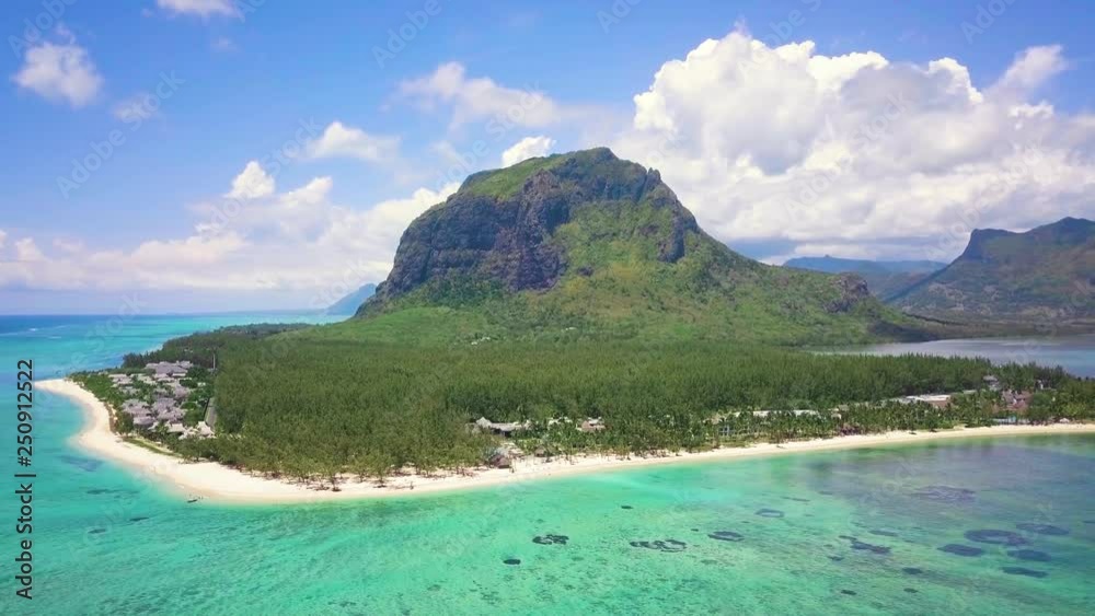 Aerial view of Le Morne in Mauritius. Flight along the beach with a view of the beautiful mountain.