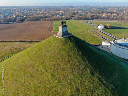 Aerial view of The Lion's Mound with farm land around. The immense Butte Du Lion on the battlefield of Waterloo where Napoleon died. Belgium. 