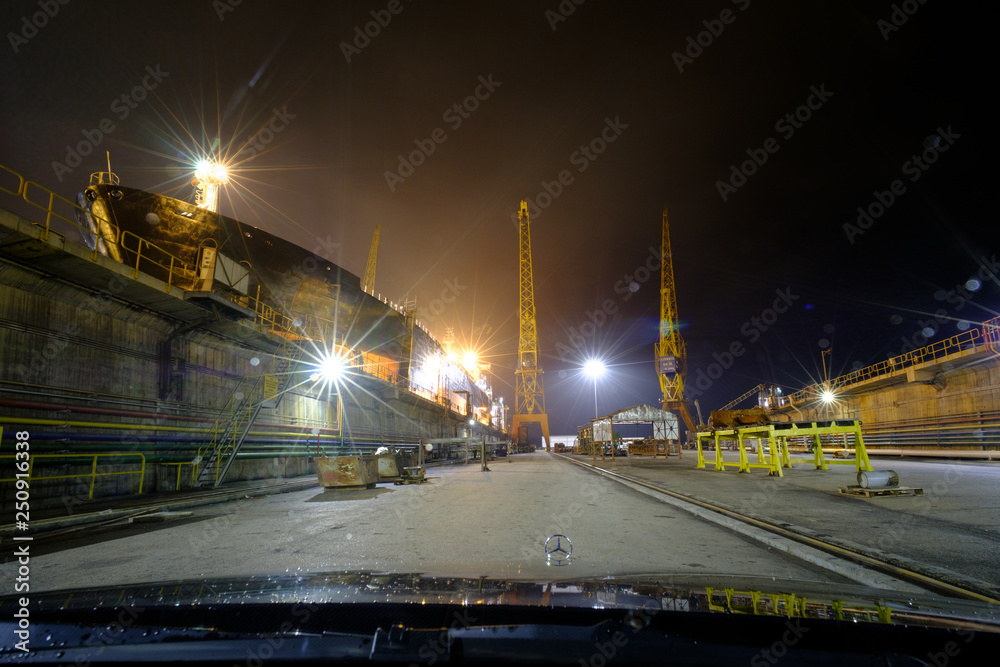 Vessel in a dry dock in Setubal, Portugal at night time
