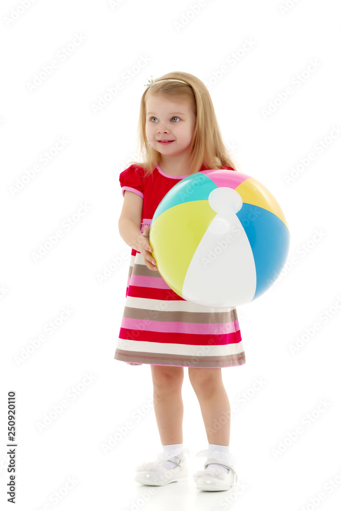 Little girl is playing with a ball Little girl is playing with a ball