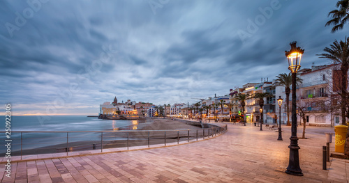 beach walk at sunset in playa san sebastian Sitges catalunya spain