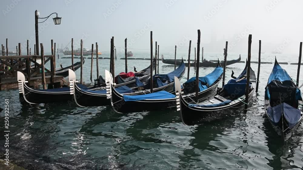 Venice, Italy - Palaces and Gondolas of the San Marco Basin wrapped in fog Venice, Italy - Palaces and Gondolas of the San Marco Basin wrapped in fog