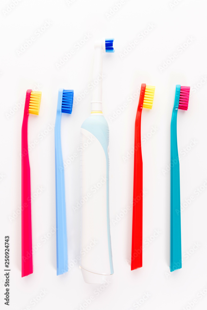 Manual and electric toothbrushes isolated on white background. Dental care