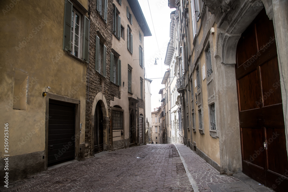 Street of the old city of Bergamo .  Italy .