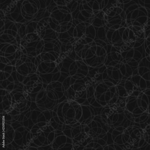 Abstract seamless pattern of randomly arranged contours of circles in black and gray colors