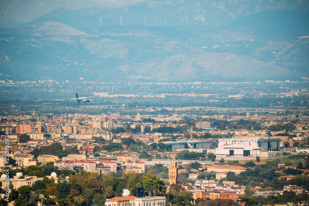 Naples, Italy. Plane Is Landing At Naples International Airport