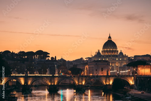 Rome, Italy. Papal Basilica Of St. Peter In The Vatican And Aelian Bridge In Sunset Sunrise Time