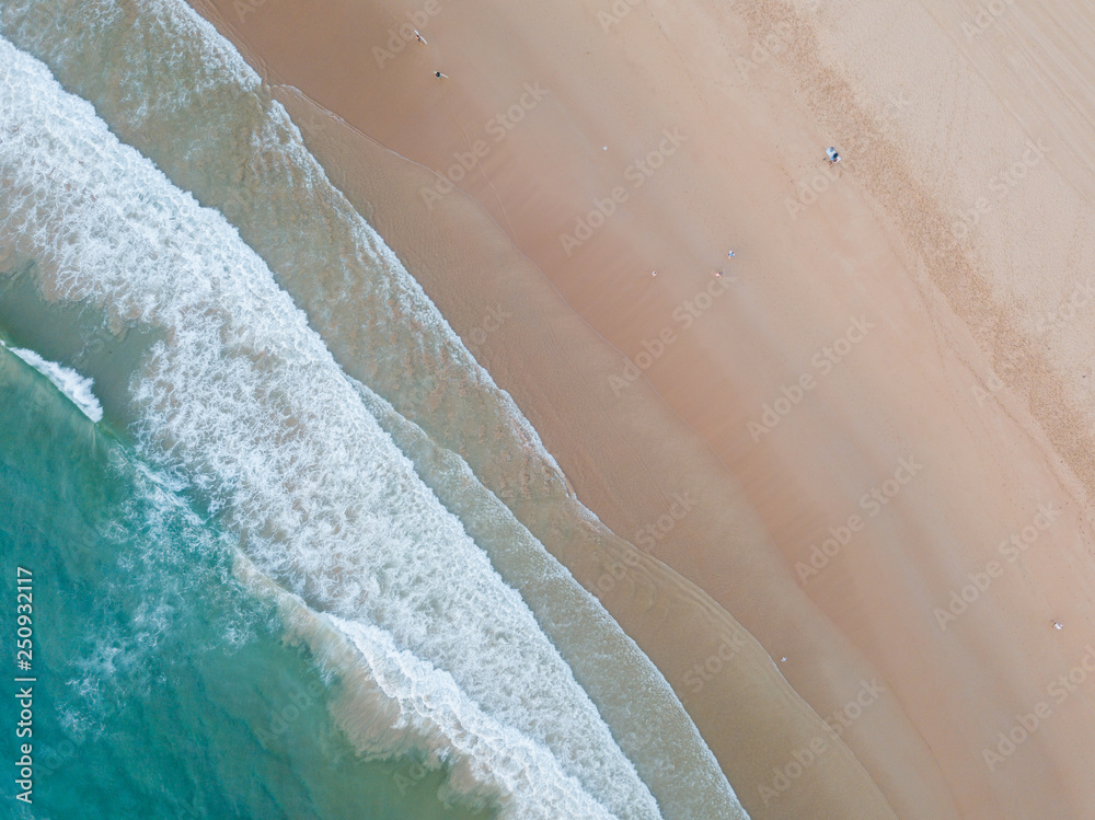 Top down aerial view of clean beach coastline. Top down aerial view of clean beach coastline.