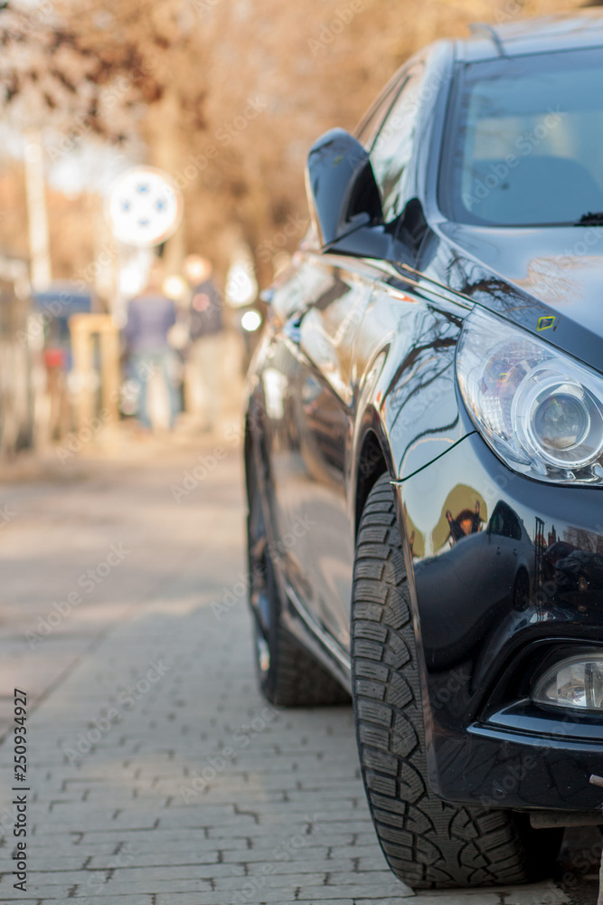 Fototapeta premium Closeup headlights of car on the street