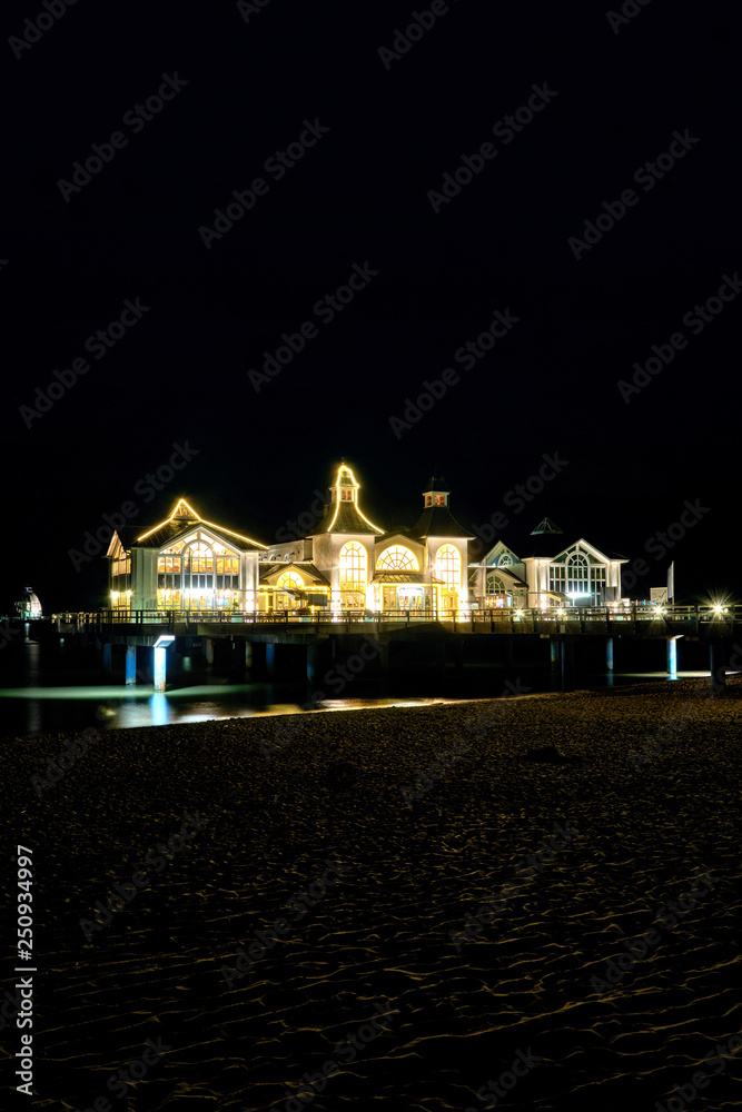 Selliner pier at night on the beach in Sellin. On the island of Rügen in Germany.