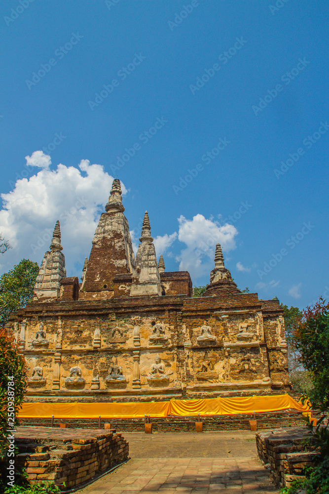 Wat Chet Yot (Wat Jed Yod) or Wat Photharam Maha Vihara, the public Buddhist temple with crowning the flat roof of the rectangular windowless building are seven spires. Located in Chiang Mai, Thailand
