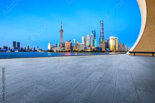 Canvas Print Empty square floor with panoramic city skyline in shanghai at night,China
