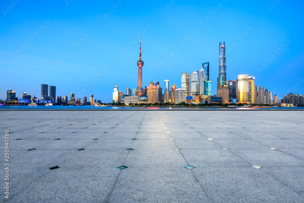 Empty square floor with panoramic city skyline in shanghai,china Empty square floor with panoramic city skyline in shanghai,china