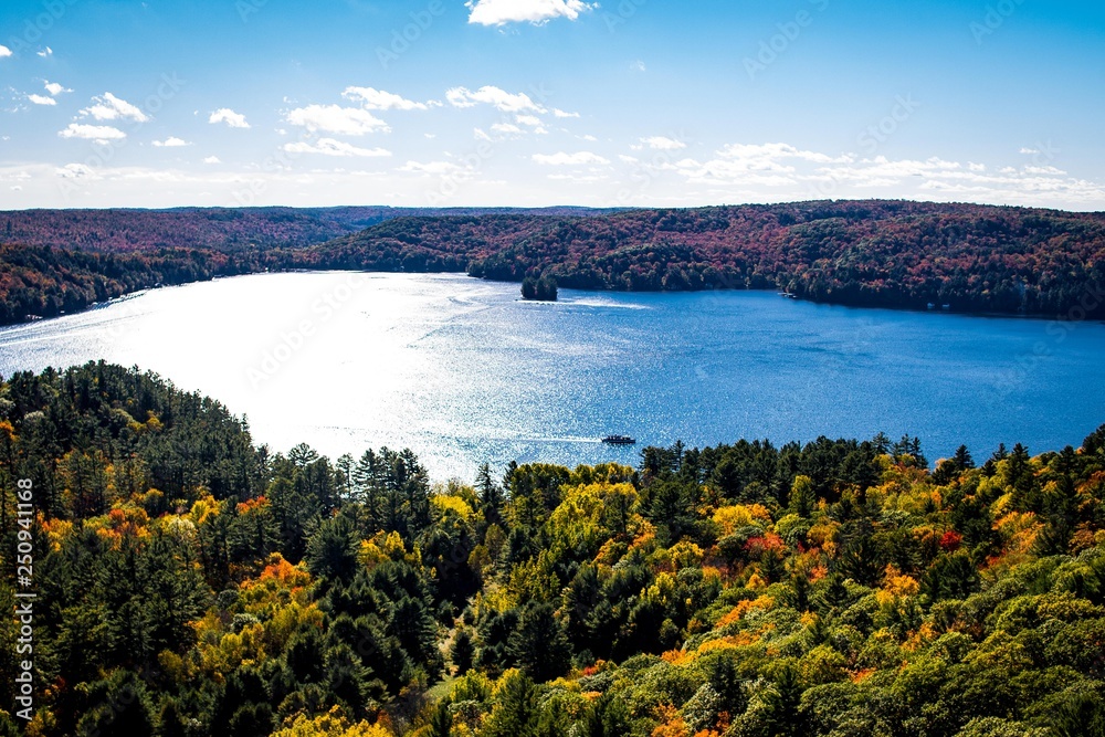 Bright Autumn Fall Day with Color over Water Bright Autumn Fall Day with Color over Water