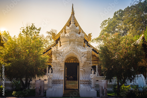 Beautiful Buddhist temple entrance gate to church at Wat Ram Poeng (Tapotaram) temple, Chiang Mai, Thailand. Wat Rampoeng is one of the most famous place for studying meditation in Chiang Mai. photo