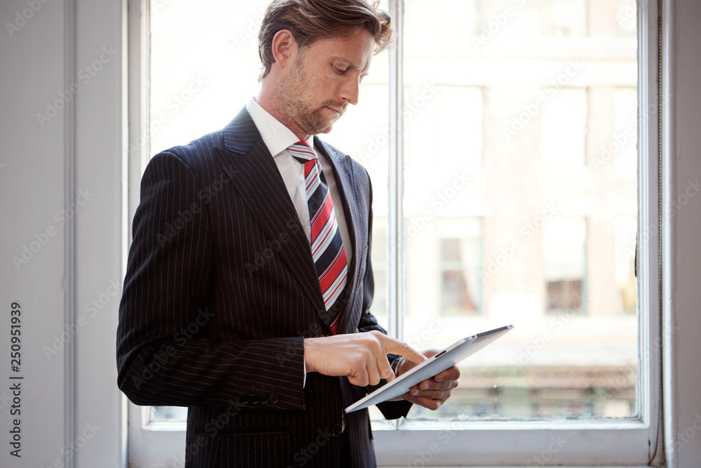 Businessman using digital tablet Businessman using digital tablet