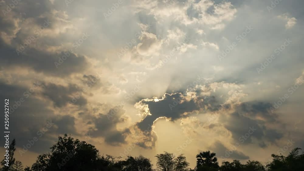 Beautiful cloudscape with large building clouds and sunset breaking through cloud mass timelapse 4k UHD Beautiful cloudscape with large building clouds and sunset breaking through cloud mass timelapse 4k UHD