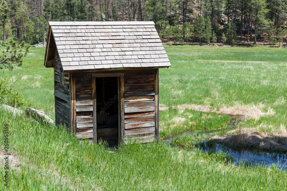 Old Outhouse Next to a Meadow Old Outhouse Next to a Meadow