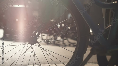 Bicycle parked on sidewalk, ecotourism and healthy lifestyle, rent service photo