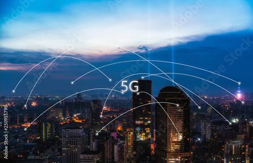 5G network wireless systems and internet of things with modern city skyline