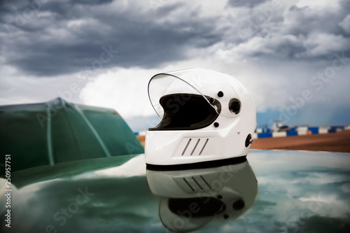 Helmet on roof of racecar 