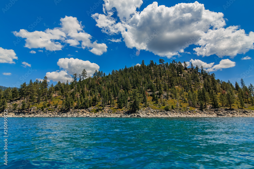 Mountains seen across the water from the boat on Lake Tahoe in California, USA
