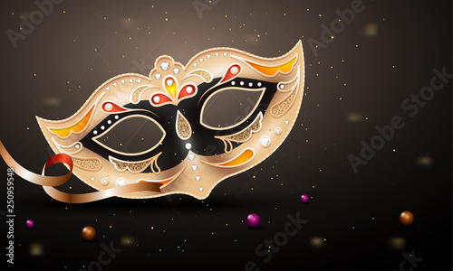 Decorative golden party mask on glossy gray background for Carnival party celebration concept.
