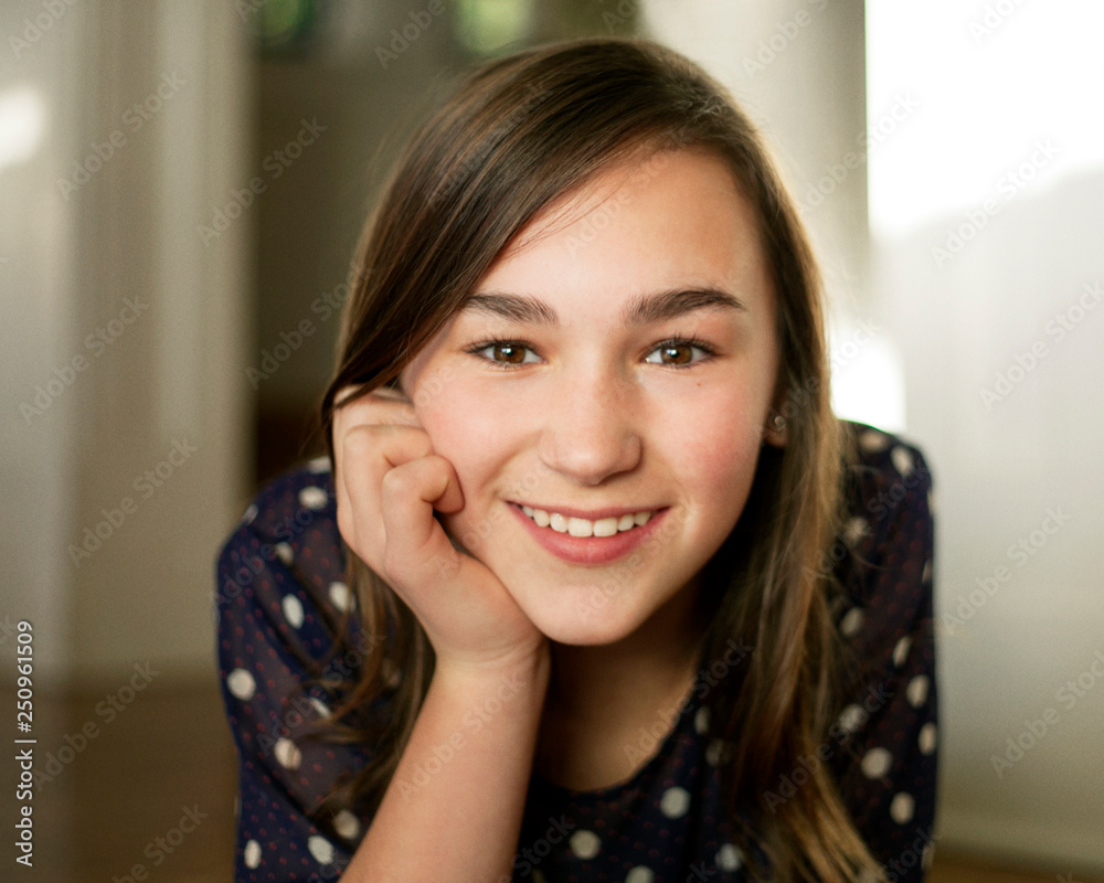 Portrait of smiling teenage girl (12-13) Portrait of smiling teenage girl (12-13)