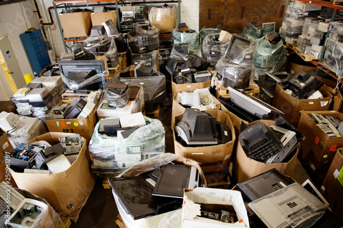 Boxes with old tv's and computer screens  photo